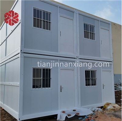 Casa de contenidors plegable